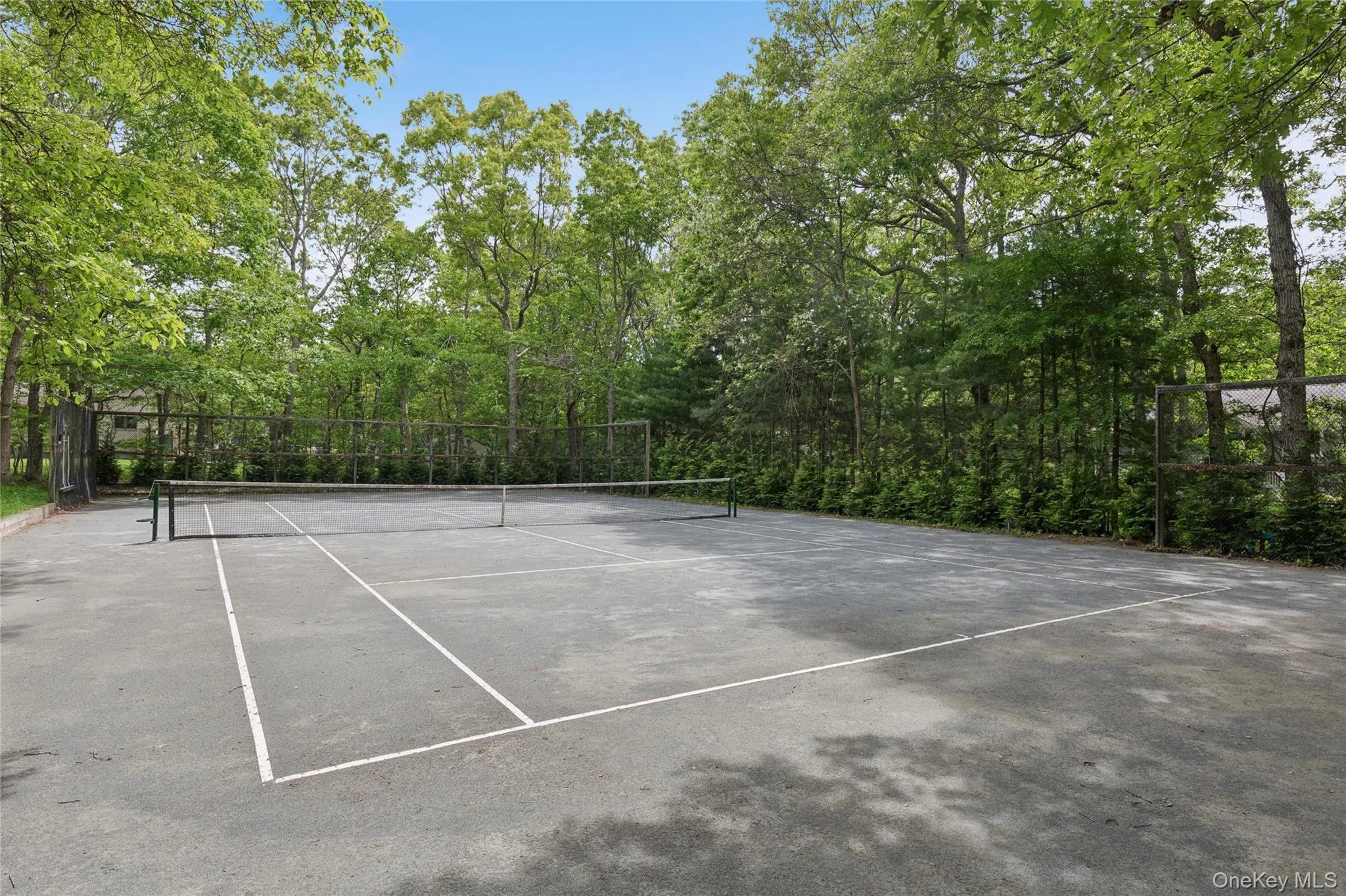 View of tennis court View of tennis court