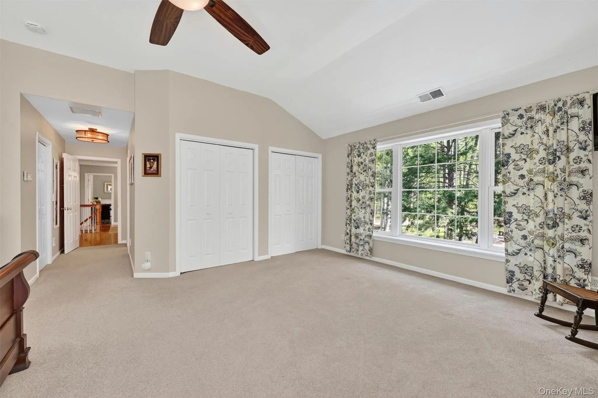 Primary bedroom with 3 sets of closets and en suite bathroom with soaking tub. Primary bedroom with 3 sets of closets and en suite bathroom with soaking tub.