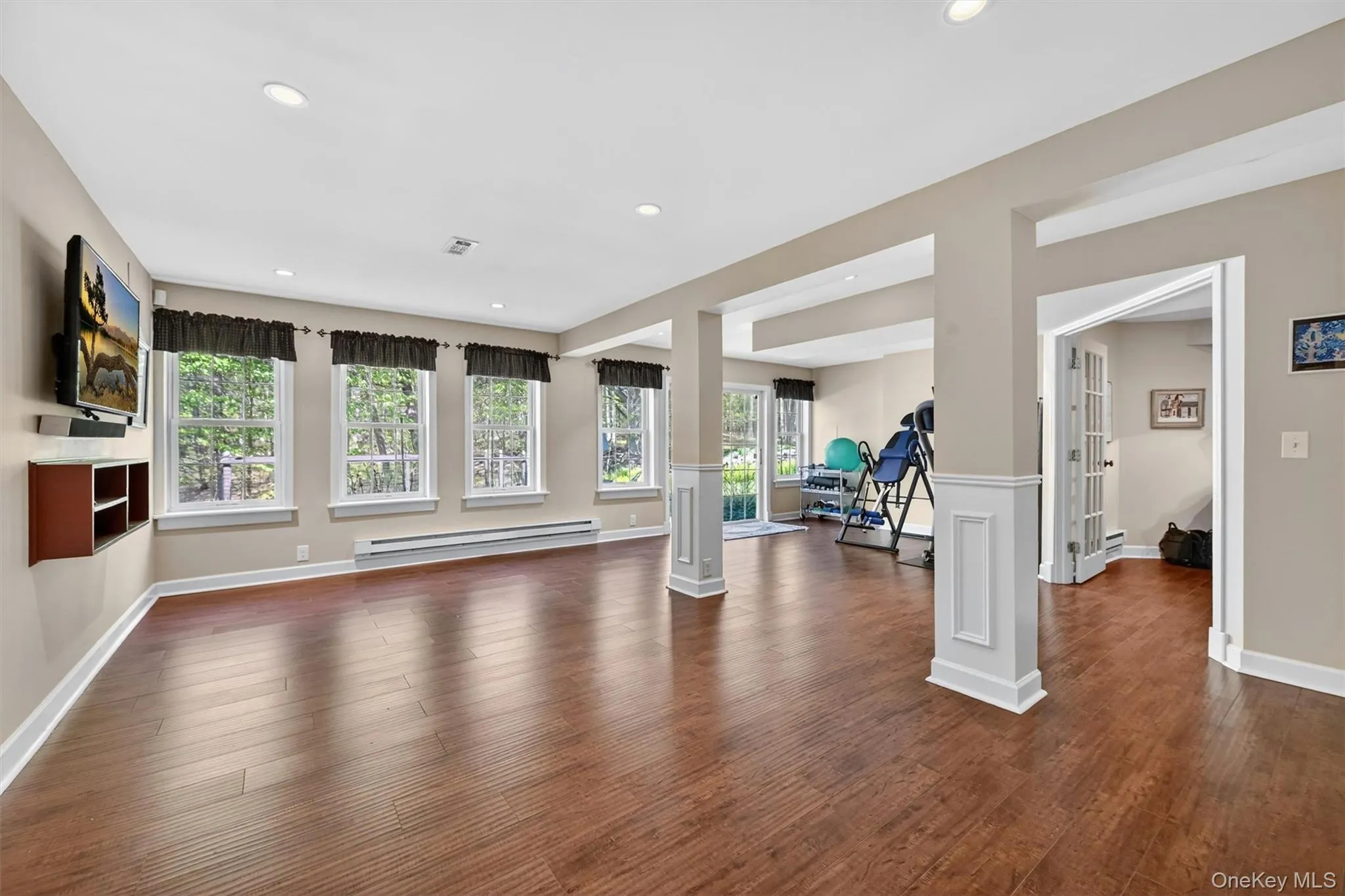 Large windows and sliding glass doors to side property Large windows and sliding glass doors to side property