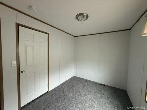 View of carpeted spare room View of carpeted spare room