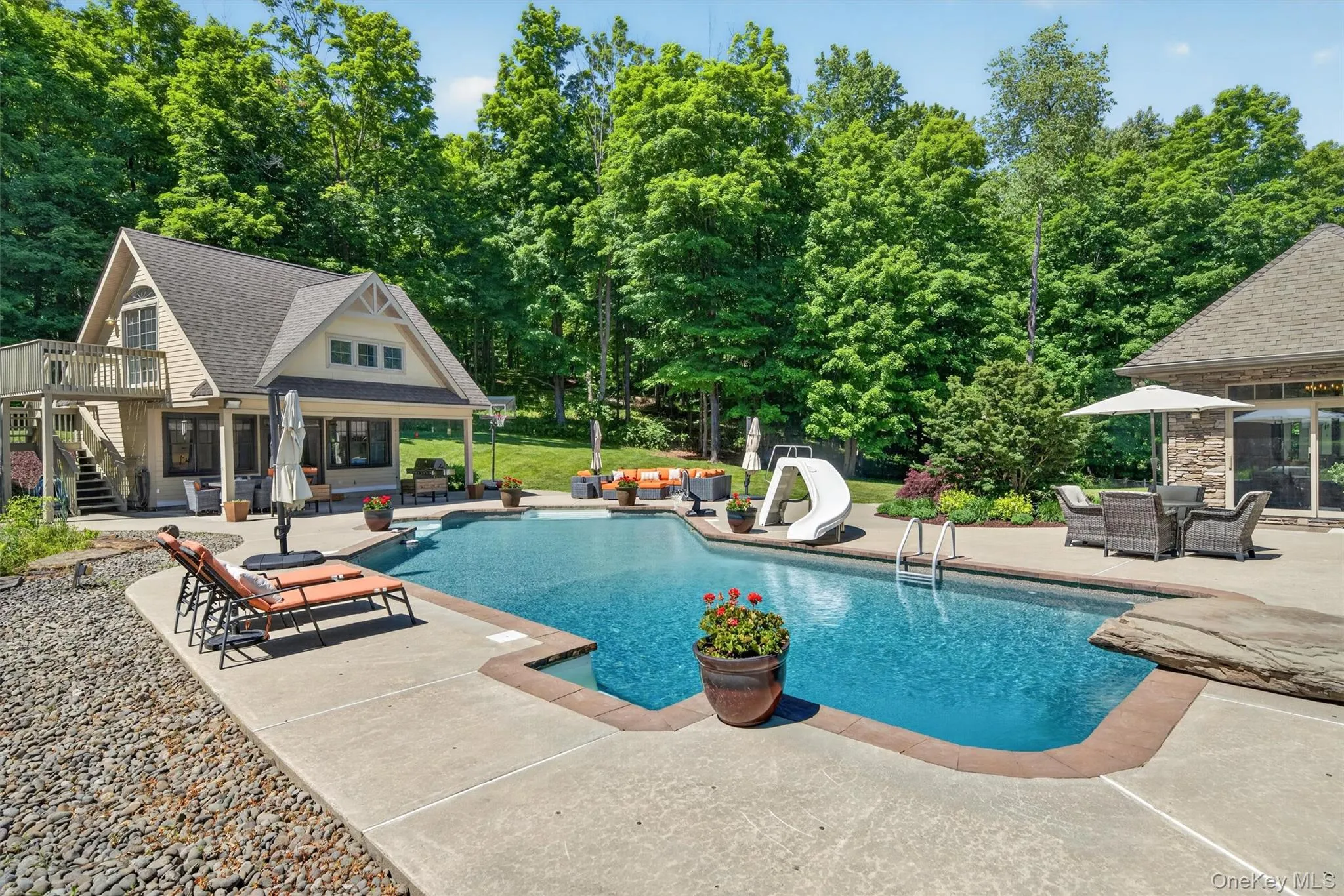 Salt Water pool with Diving rock and slide Salt Water pool with Diving rock and slide