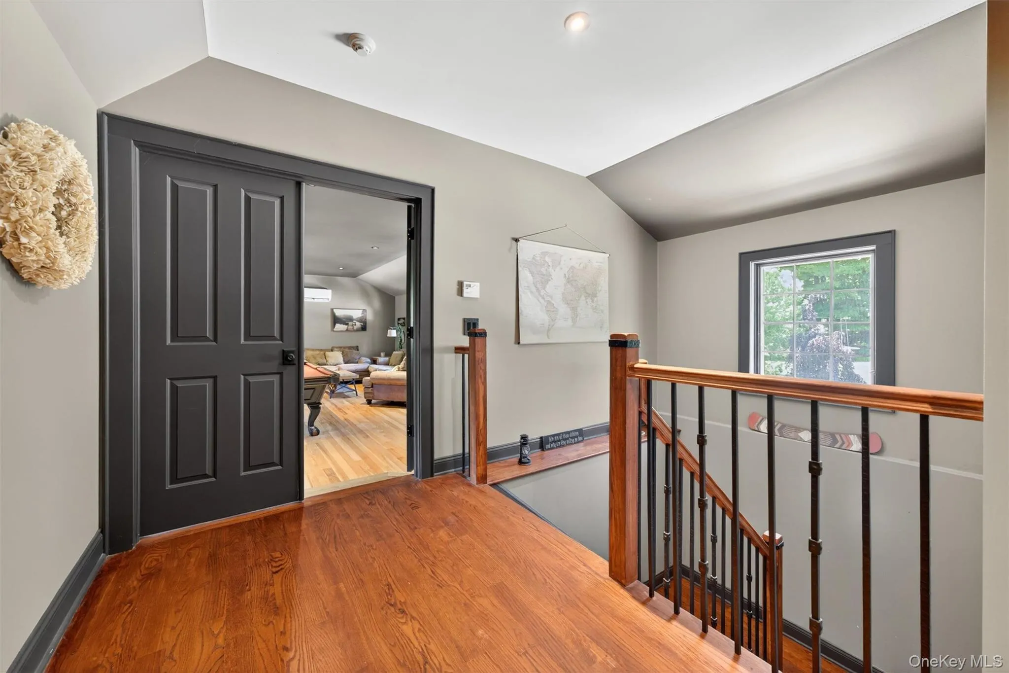 Back stairwell from main level leads up to the bonus room Back stairwell from main level leads up to the bonus room