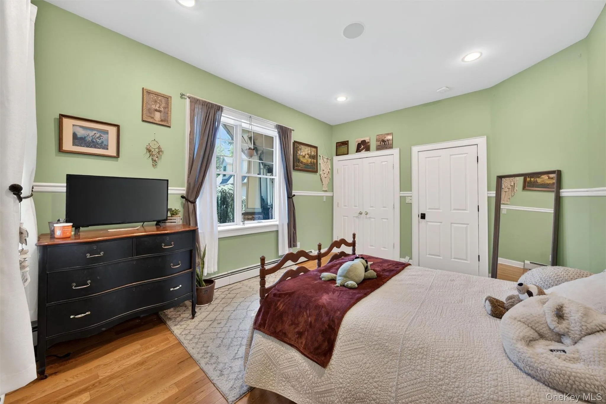 Bright and cheerful bedroom on main floor Bright and cheerful bedroom on main floor