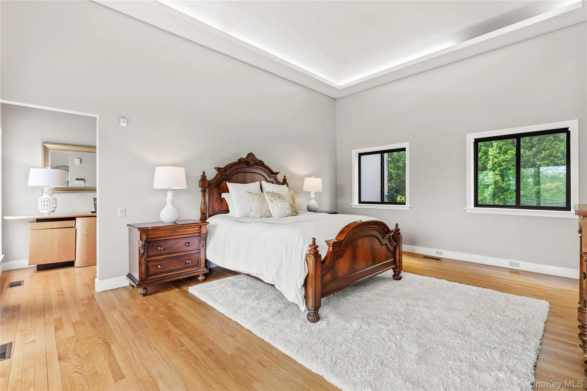 Primary Bedroom with Ensuite bathroom , his/hers walk in closets, with private deck/balcony Primary Bedroom with Ensuite bathroom , his/hers walk in closets, with private deck/balcony