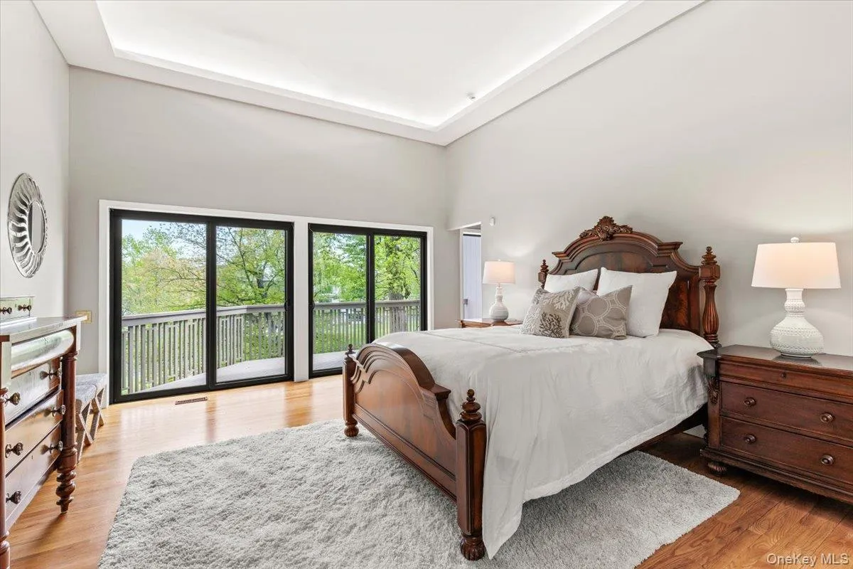 Primary Bedroom with Ensuite bathroom , his/hers walk in closets, with private deck/balcony Primary Bedroom with Ensuite bathroom , his/hers walk in closets, with private deck/balcony
