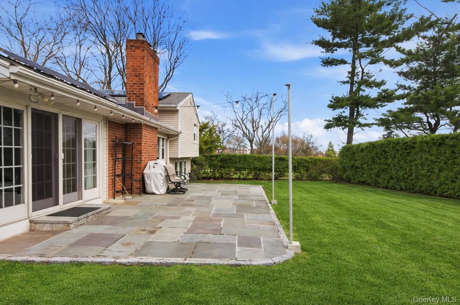 Fenced yard featuring a patio Fenced yard featuring a patio
