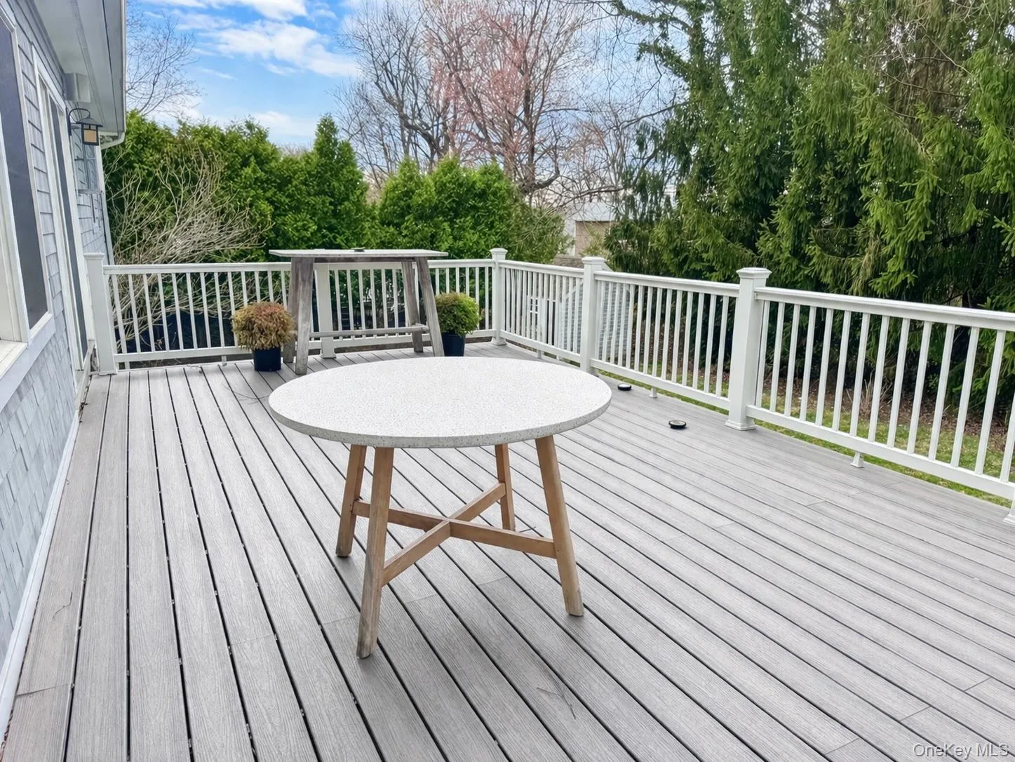 Deck provides alfresco dining, easy grilling and access from Breakfast Room and Living Room Deck provides alfresco dining, easy grilling and access from Breakfast Room and Living Room