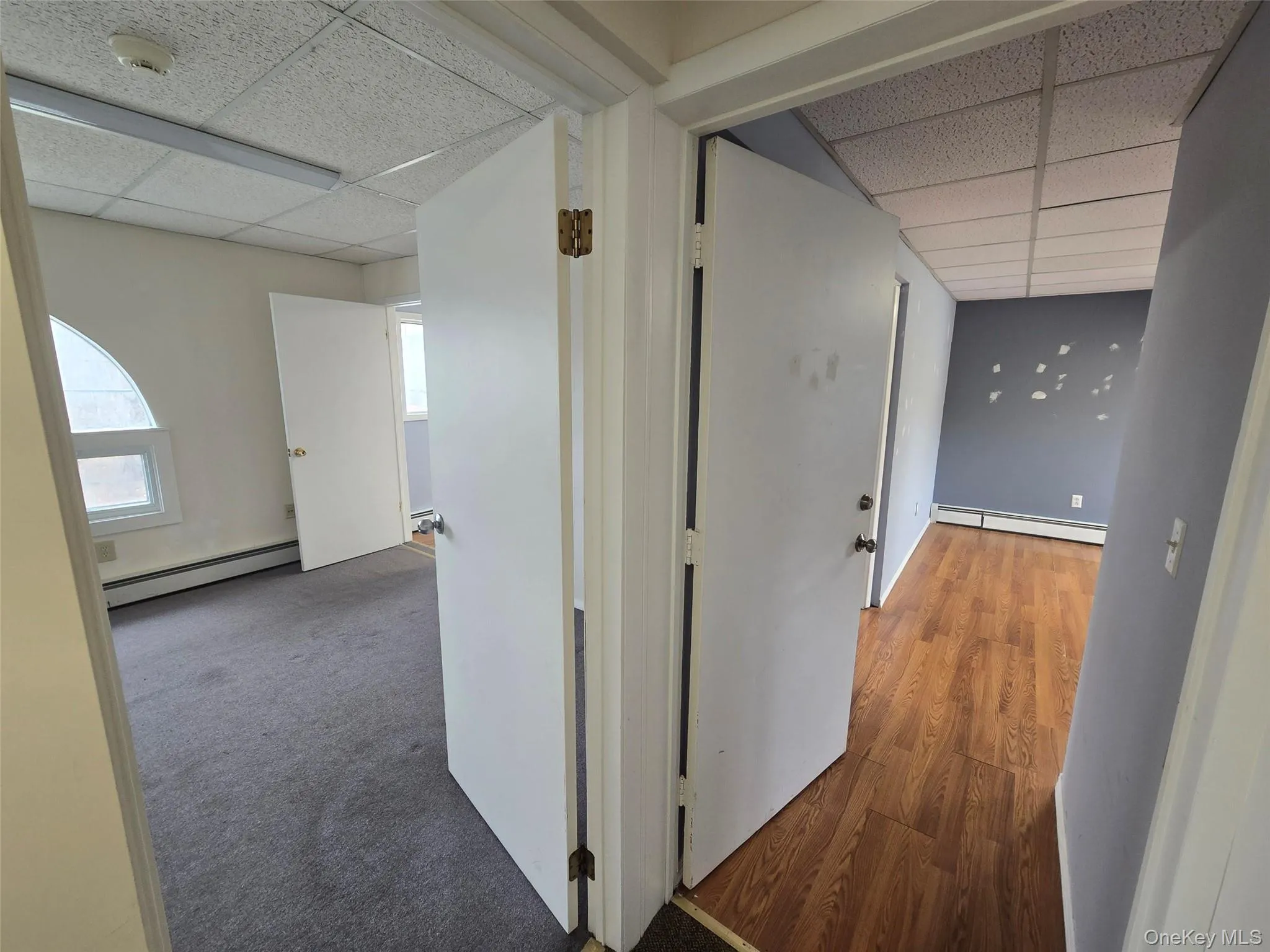 View from hallway showing doors into room # 1 and room # 3 View from hallway showing doors into room # 1 and room # 3