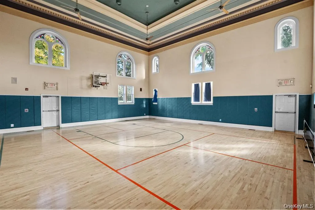 The full-size indoor basketball court provides a bright, open space for year-round recreation and fitness within the Chapel Hill clubhouse. The full-size indoor basketball court provides a bright, open space for year-round recreation and fitness within the Chapel Hill clubhouse.