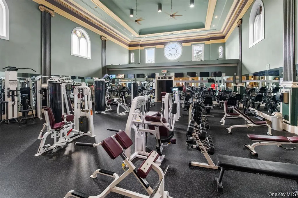 The state-of-the-art fitness center offers a full range of cardio and strength-training equipment in a beautifully designed space with high ceilings and natural light. The state-of-the-art fitness center offers a full range of cardio and strength-training equipment in a beautifully designed space with high ceilings and natural light.