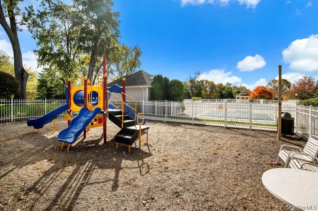 The community playground offers a fun, family-friendly space surrounded by scenic landscaping and located just steps from the pool and clubhouse. The community playground offers a fun, family-friendly space surrounded by scenic landscaping and located just steps from the pool and clubhouse.