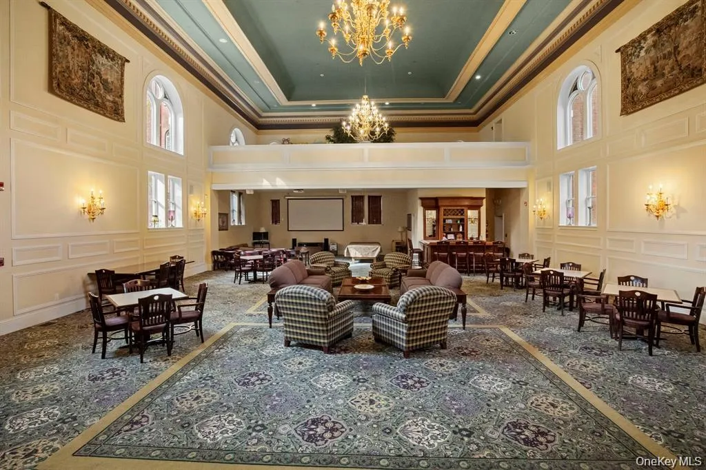 The elegant community clubhouse features soaring ceilings, chandeliers, and multiple lounge areas perfect for gatherings and social events. The elegant community clubhouse features soaring ceilings, chandeliers, and multiple lounge areas perfect for gatherings and social events.