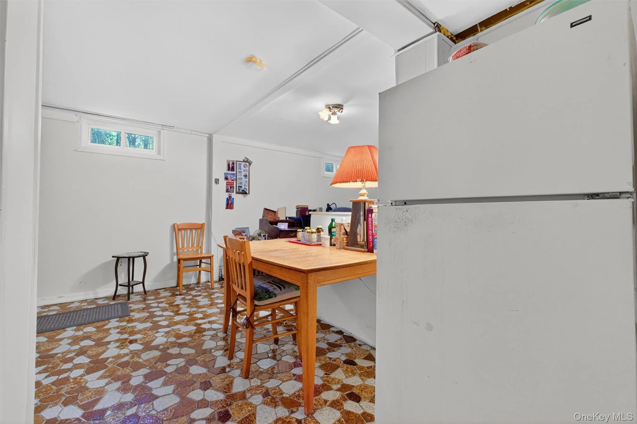 Dining space featuring light flooring Dining space featuring light flooring