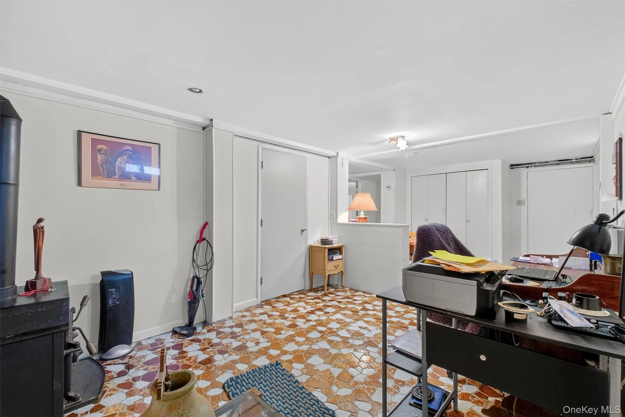Office space featuring tile patterned floors Office space featuring tile patterned floors