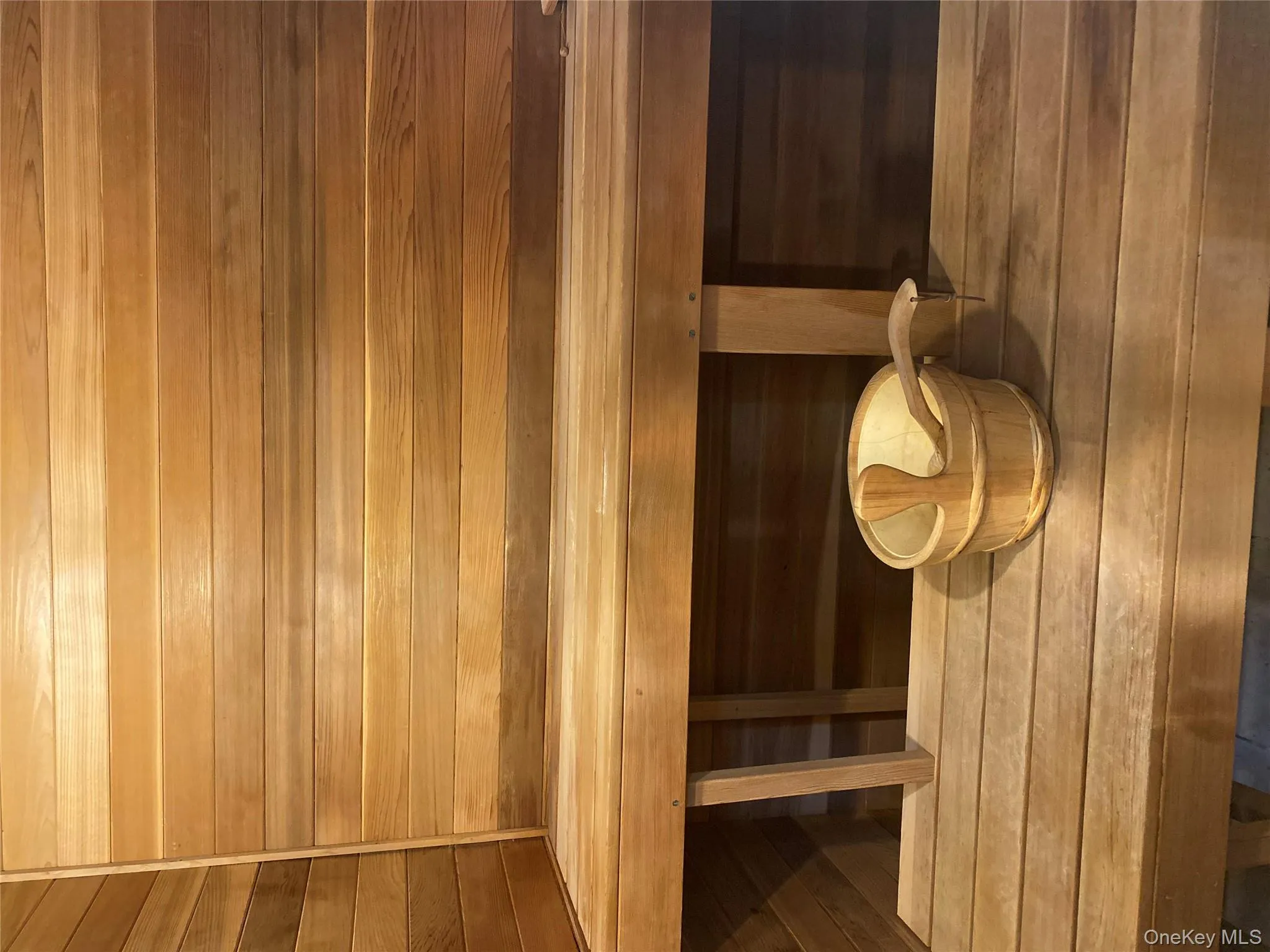 Sauna / steam room featuring wooden walls Sauna / steam room featuring wooden walls