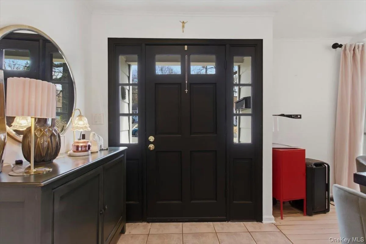 Foyer entrance featuring plenty of natural light Foyer entrance featuring plenty of natural light