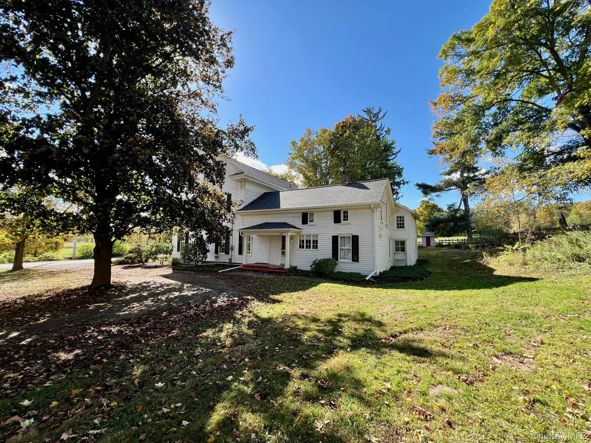 View of yard and driveway to side entrance View of yard and driveway to side entrance