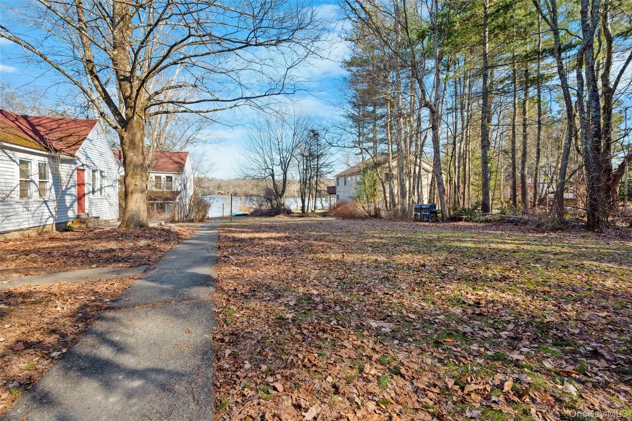 View of street featuring a water view View of street featuring a water view