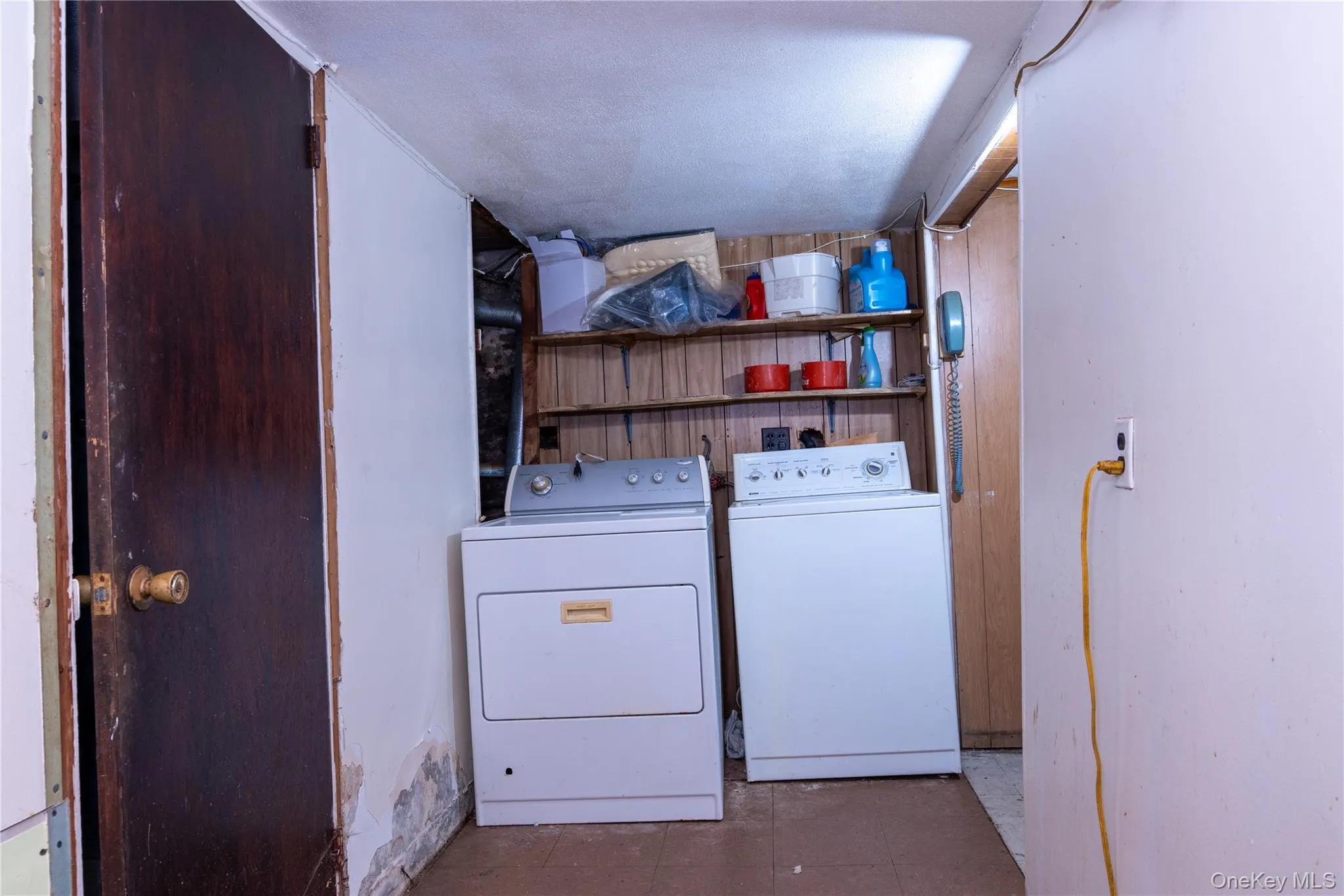 Laundry area featuring washing machine and clothes dryer Laundry area featuring washing machine and clothes dryer