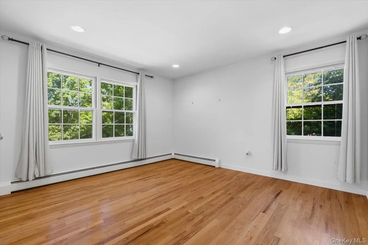 Alternate view of the corner fourth bedroom with loads of natural light as well. Alternate view of the corner fourth bedroom with loads of natural light as well.