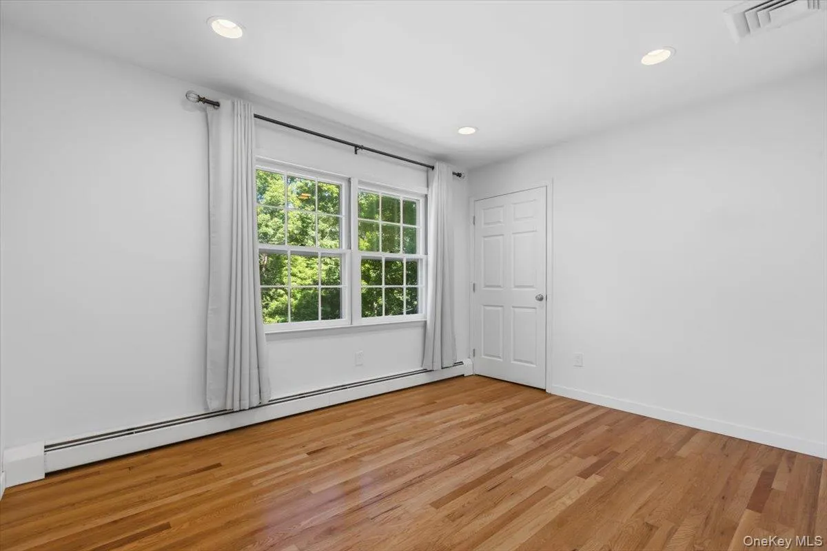 Third Bedroom with recessed lights, hardwood floors and all window treatments included. Third Bedroom with recessed lights, hardwood floors and all window treatments included.