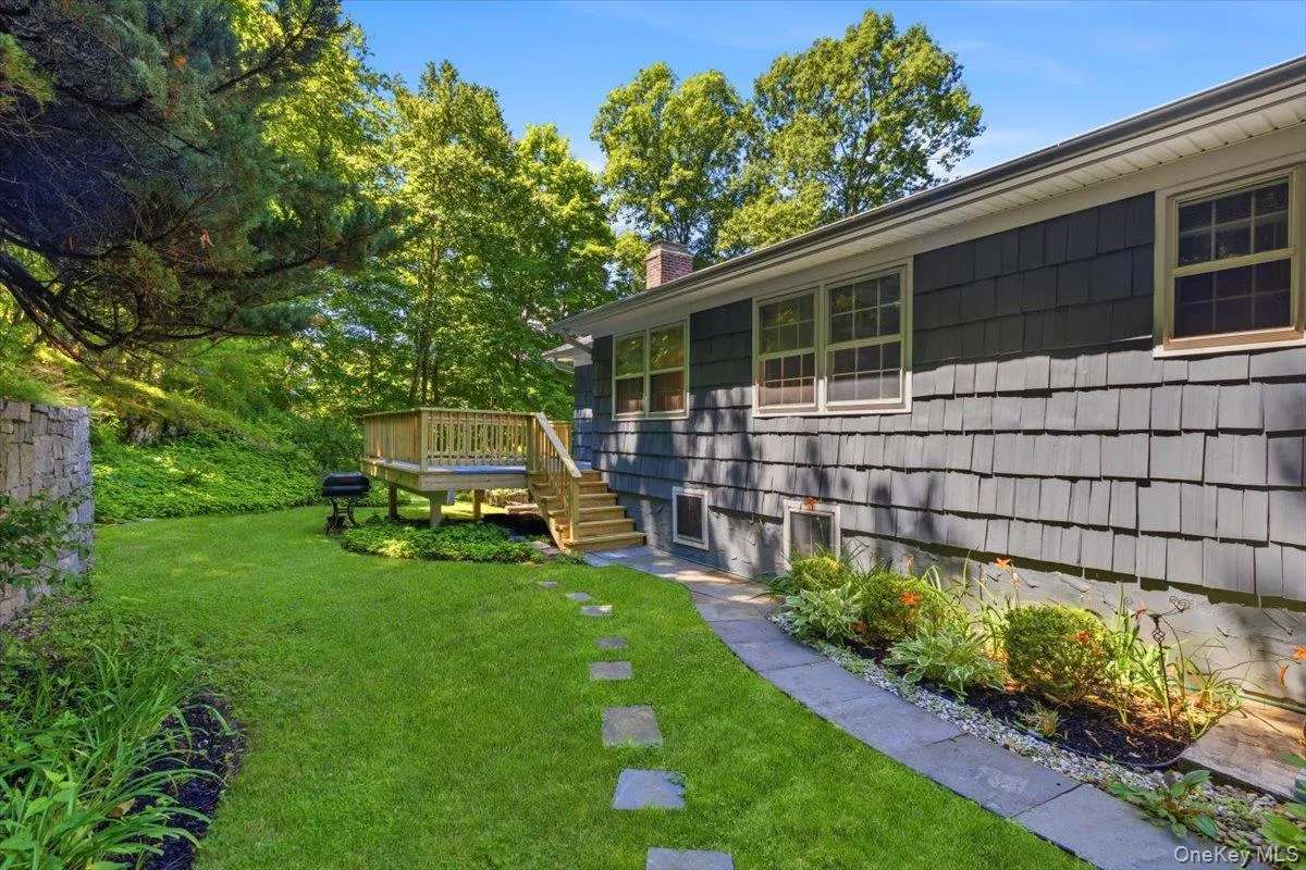 Looking back at the new rear Deck and landscaping with perennial plantings. Looking back at the new rear Deck and landscaping with perennial plantings.