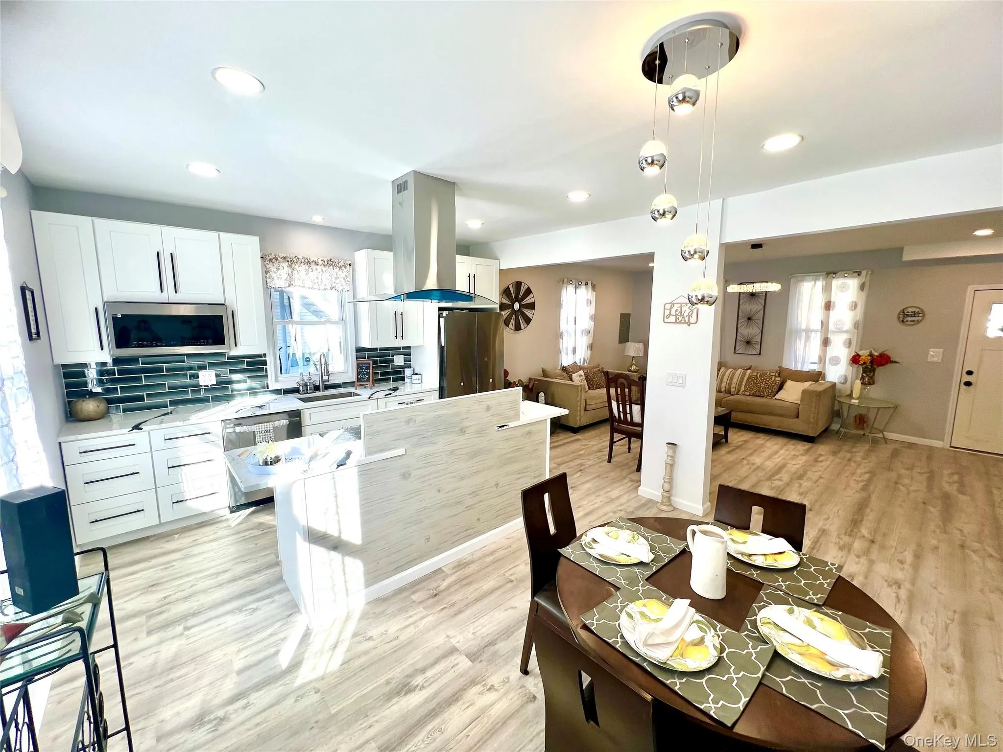 Dining area featuring light wood-type flooring and recessed lighting Dining area featuring light wood-type flooring and recessed lighting