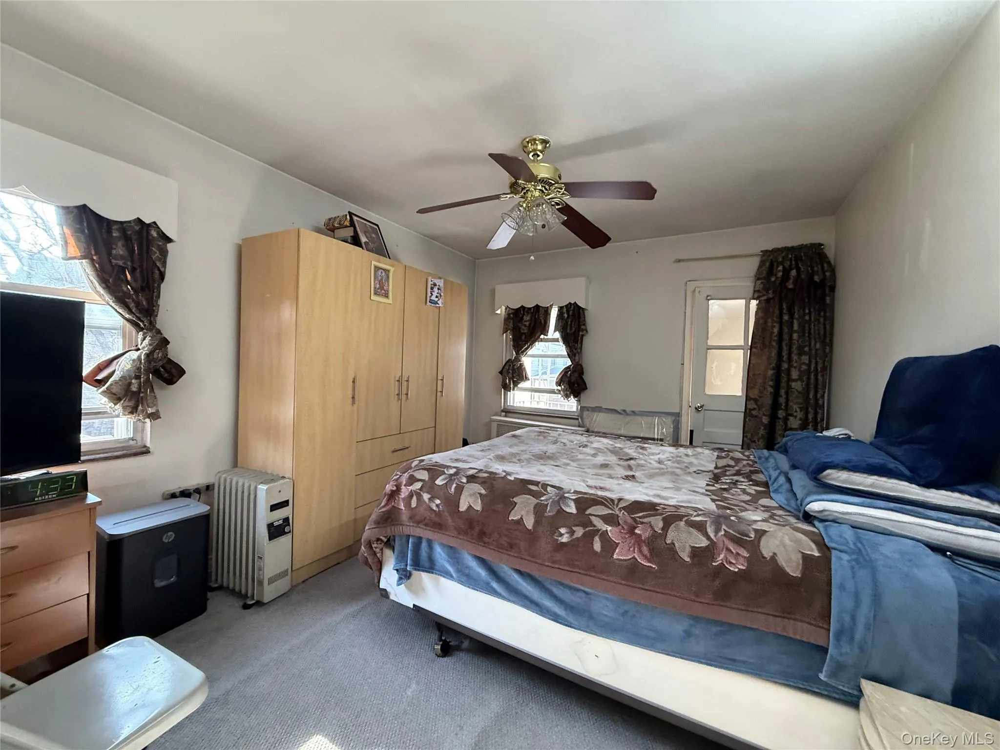 Bedroom facing the back of the house. This bedroom has access to a small balcony and terrace Bedroom facing the back of the house. This bedroom has access to a small balcony and terrace