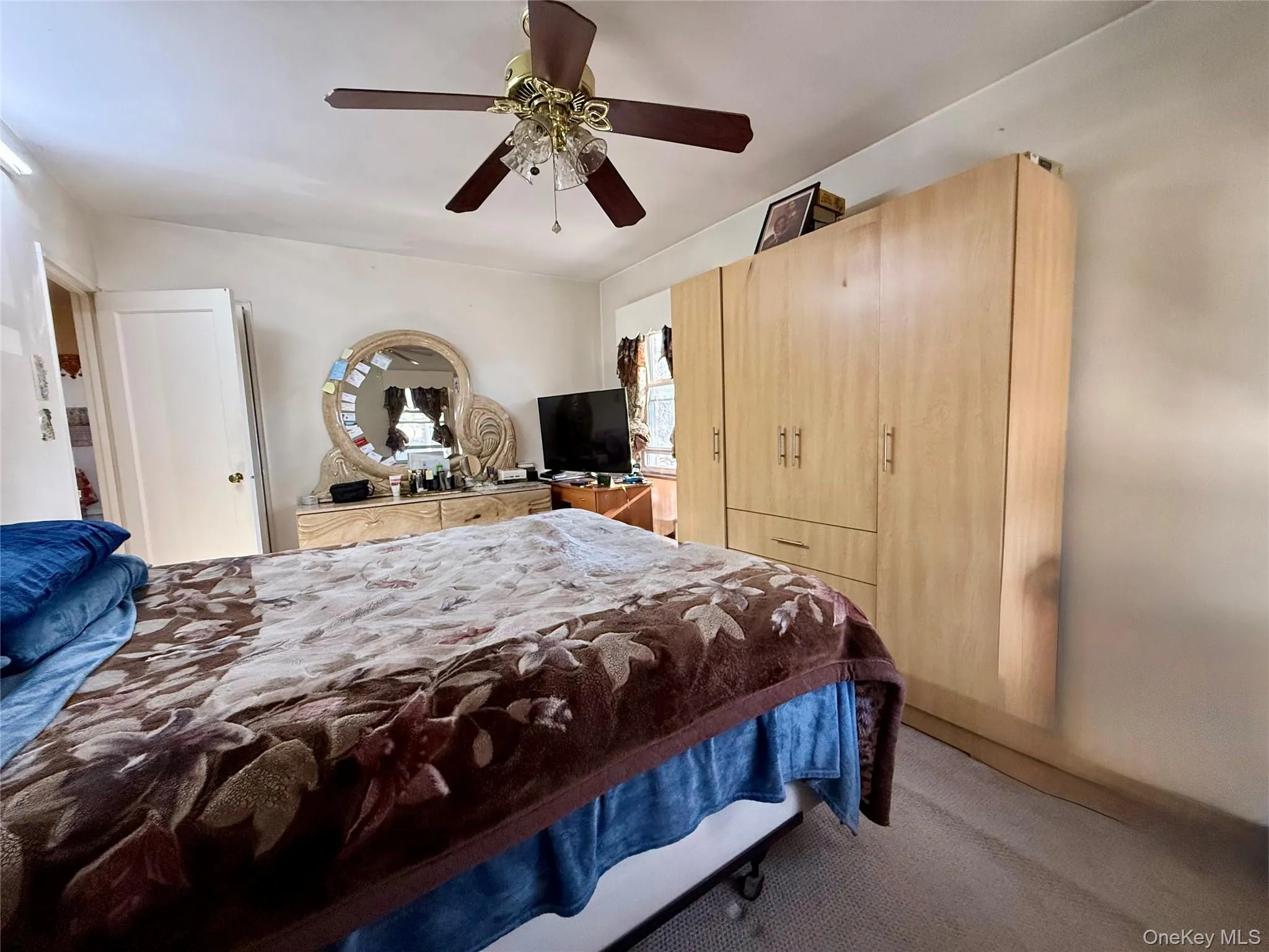 Bedroom facing the back of the house. This bedroom has access to a small balcony and terrace Bedroom facing the back of the house. This bedroom has access to a small balcony and terrace