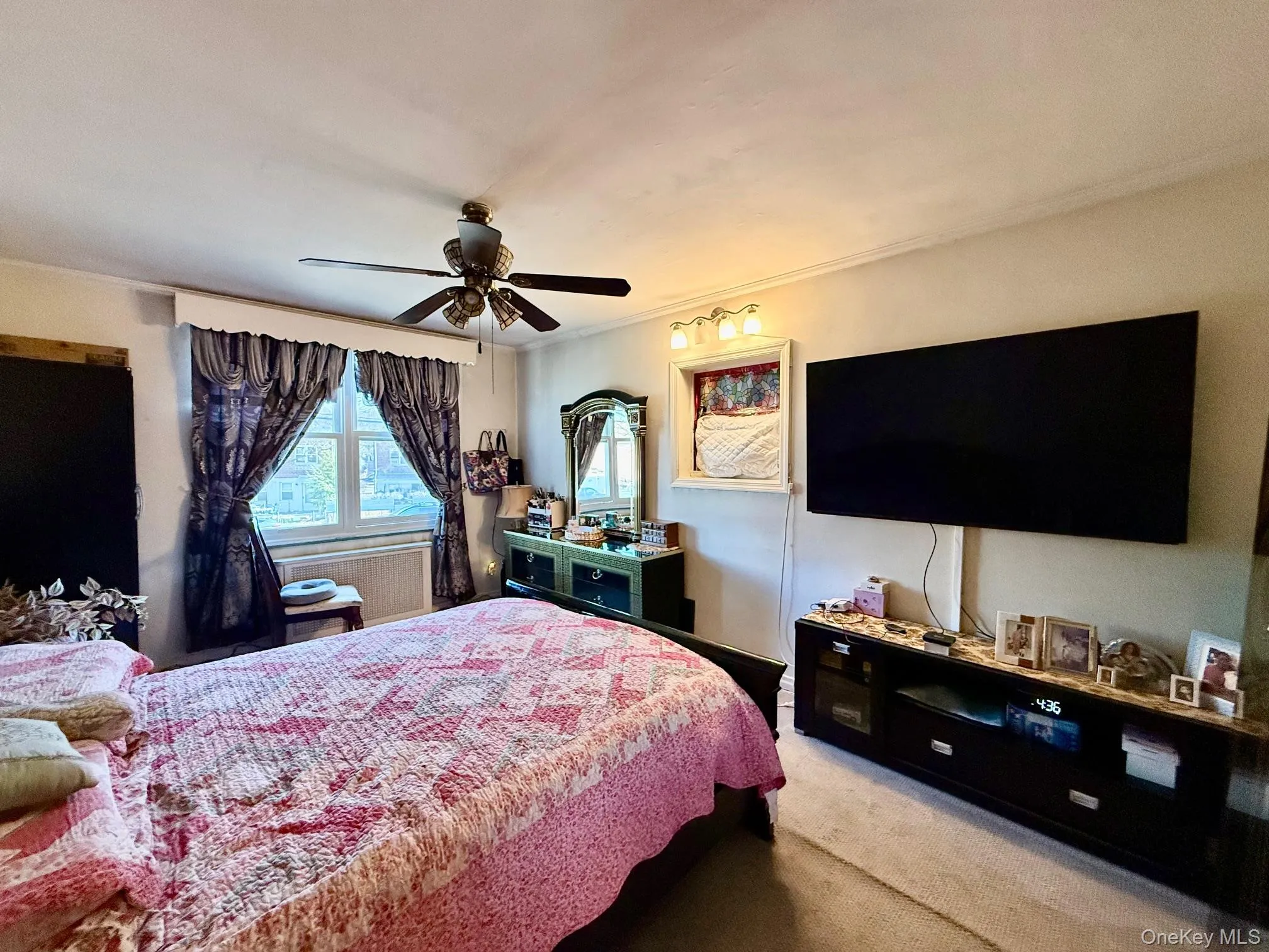 Primary bedroom faces the front of the house. Large double panel window, large closet. Primary bedroom faces the front of the house. Large double panel window, large closet.