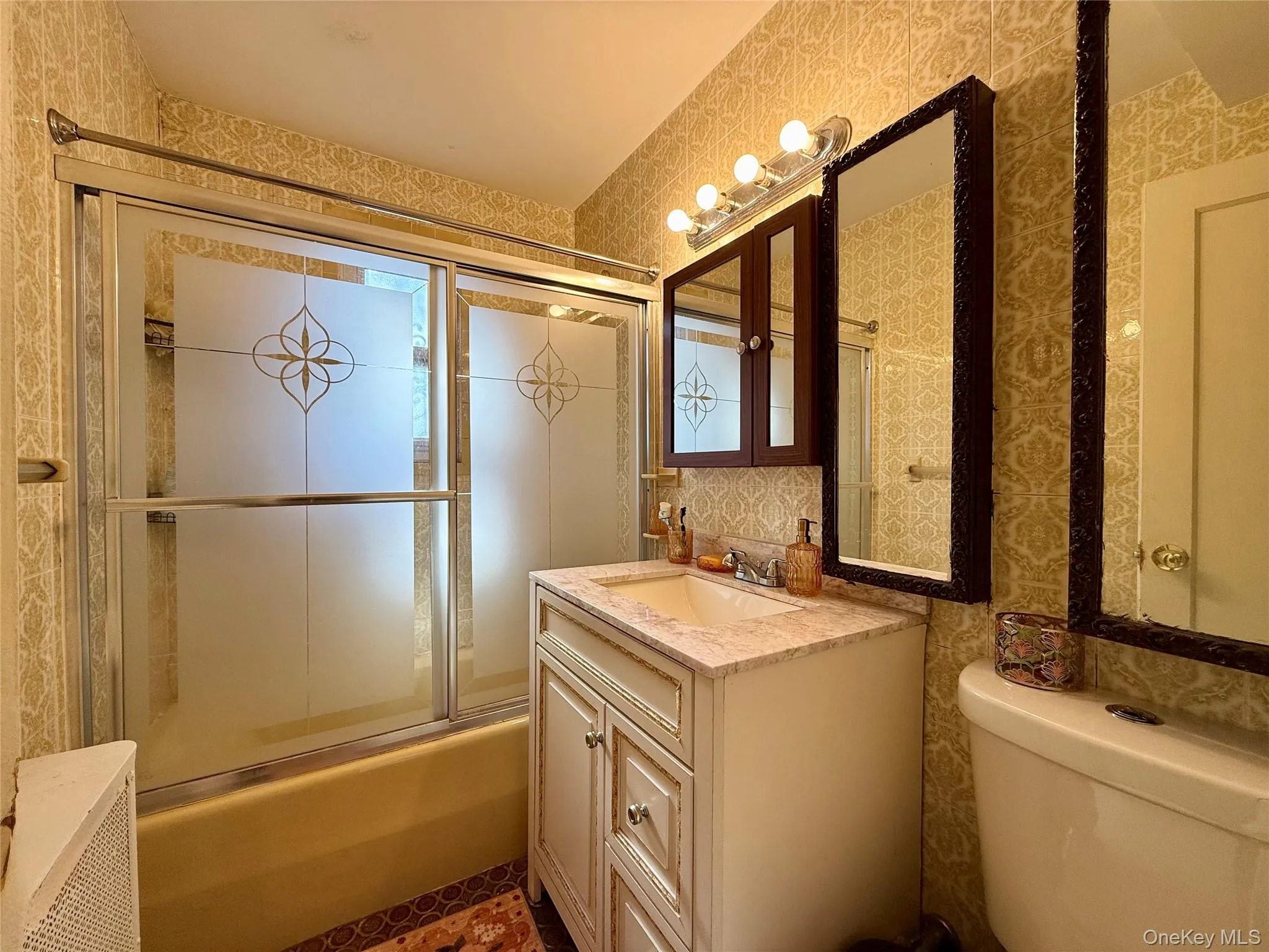 Full bathroom on the first floor. Elegant European tile floors. Large window for ventilation. Elegant tile on the walls and bathtub. Full bathroom on the first floor. Elegant European tile floors. Large window for ventilation. Elegant tile on the walls and bathtub.