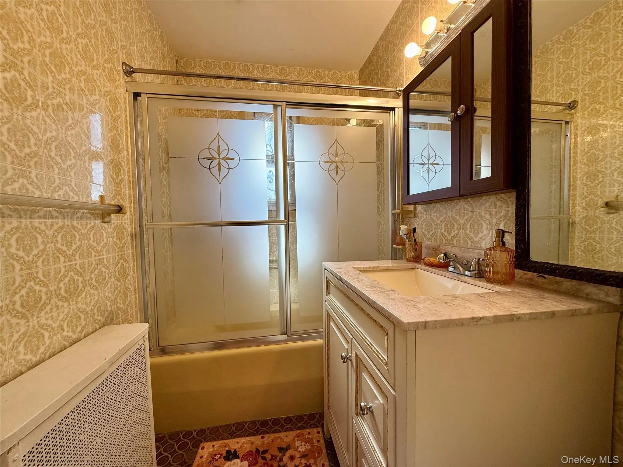 Full bathroom on the first floor. Elegant European tile floors. Large window for ventilation. Elegant tile on the walls and bathtub. Full bathroom on the first floor. Elegant European tile floors. Large window for ventilation. Elegant tile on the walls and bathtub.