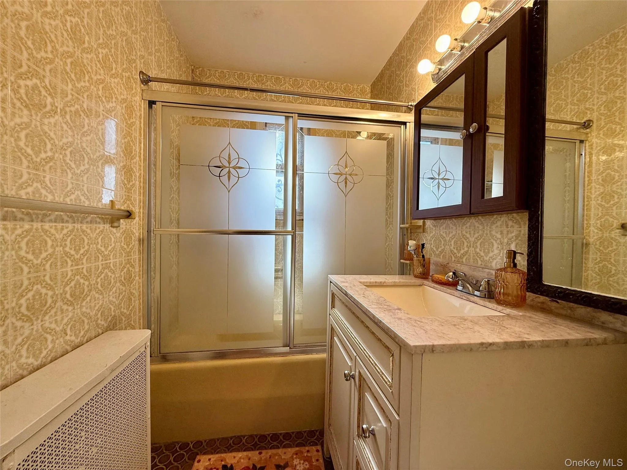 Full bathroom on the first floor. Elegant European tile floors. Large window for ventilation. Elegant tile on the walls and bathtub. Full bathroom on the first floor. Elegant European tile floors. Large window for ventilation. Elegant tile on the walls and bathtub.