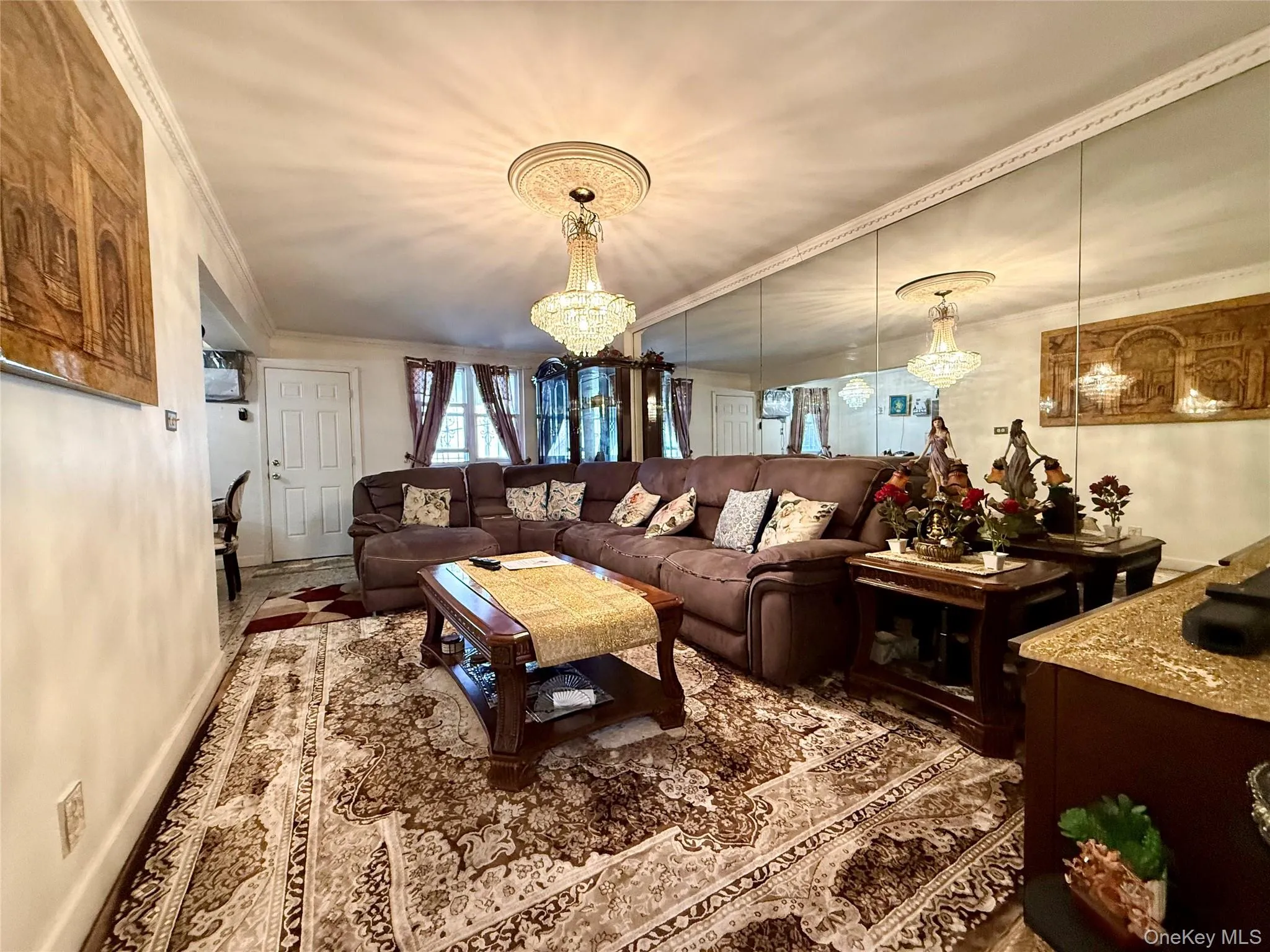 Large double panel windows, exit to the backyard and patio. Access to the detached garage Large double panel windows, exit to the backyard and patio. Access to the detached garage