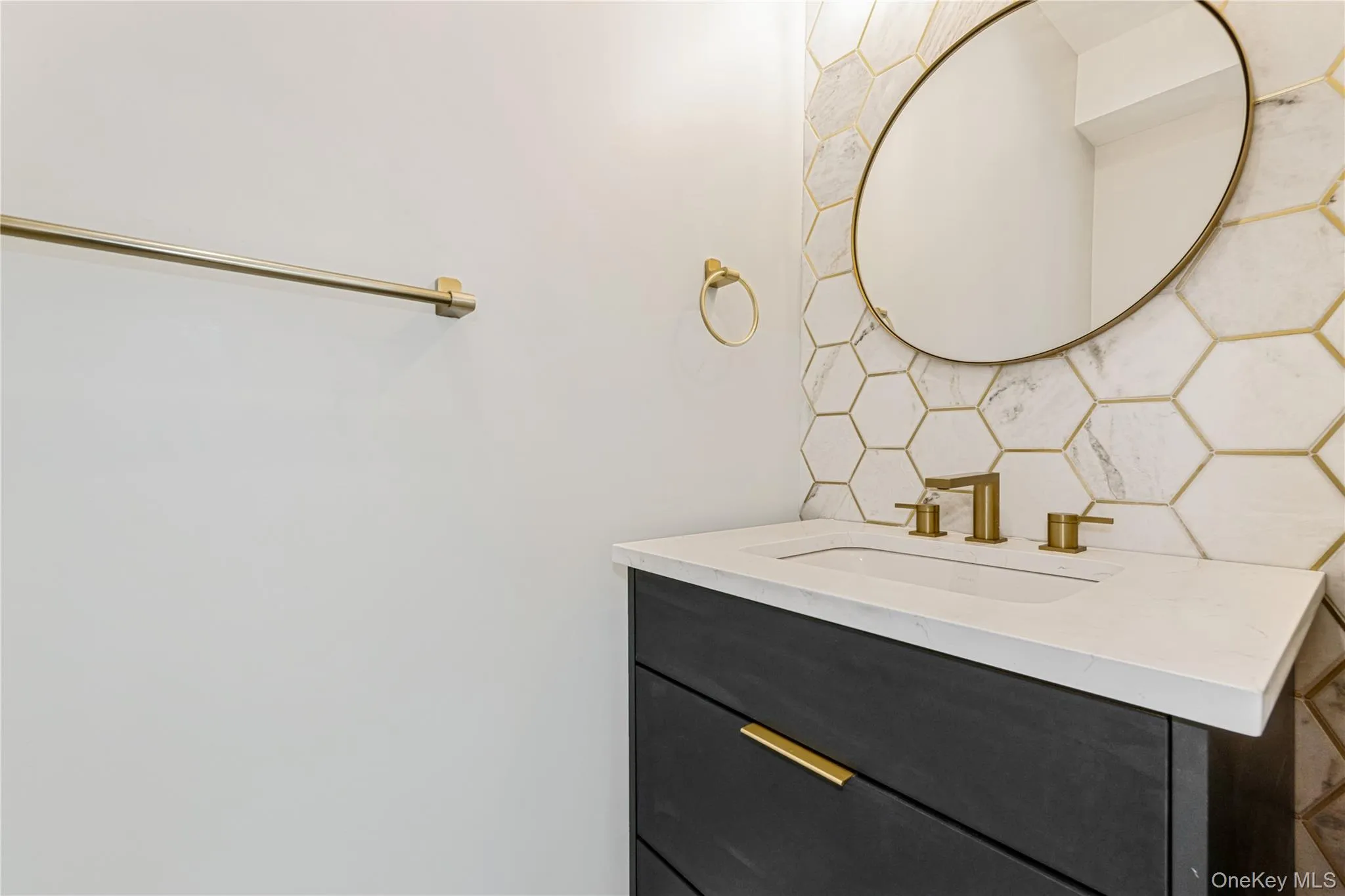 Powder Room. The photos shown are of a model unit. Powder Room. The photos shown are of a model unit.