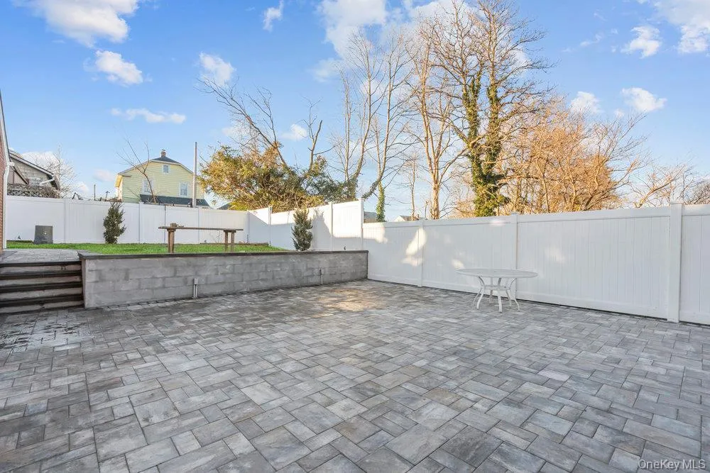 Fenced backyard featuring a patio Fenced backyard featuring a patio