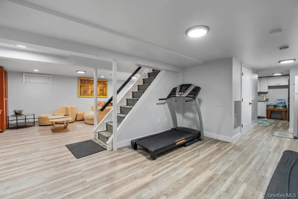 Workout room featuring light wood finished floors and recessed lighting Workout room featuring light wood finished floors and recessed lighting