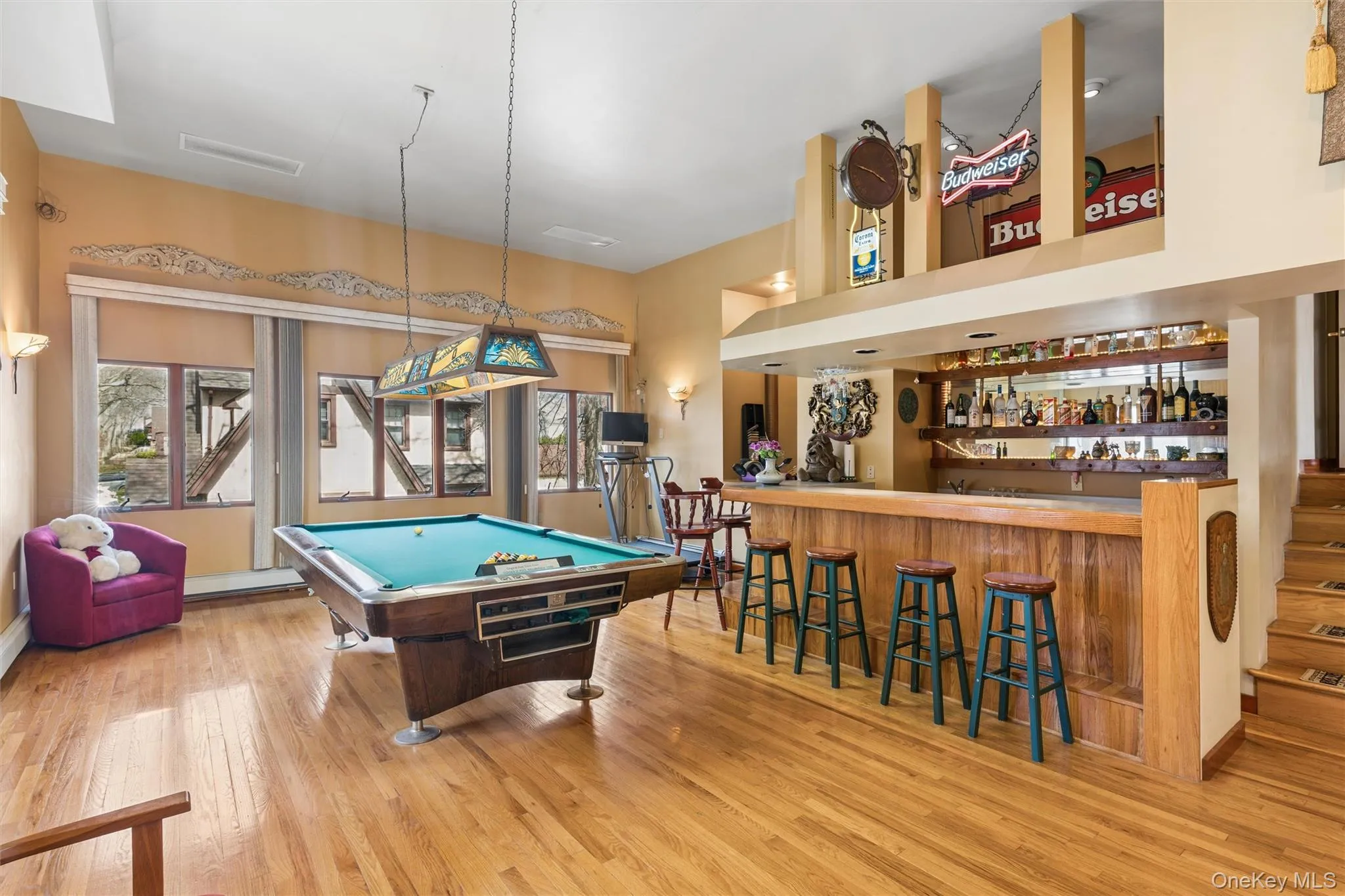 Rec room with billiards table and healthy amount of natural light Rec room with billiards table and healthy amount of natural light