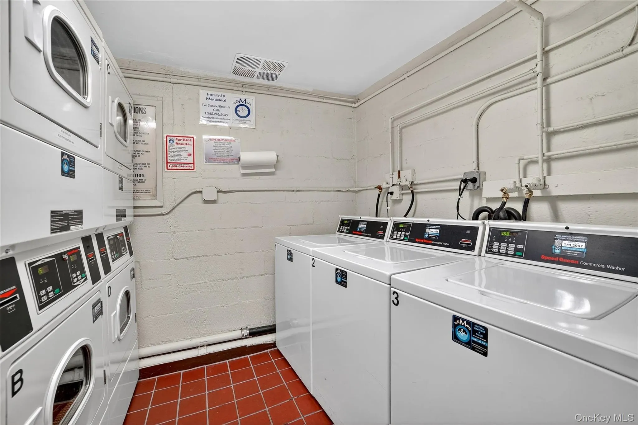 Community laundry room. Community laundry room.