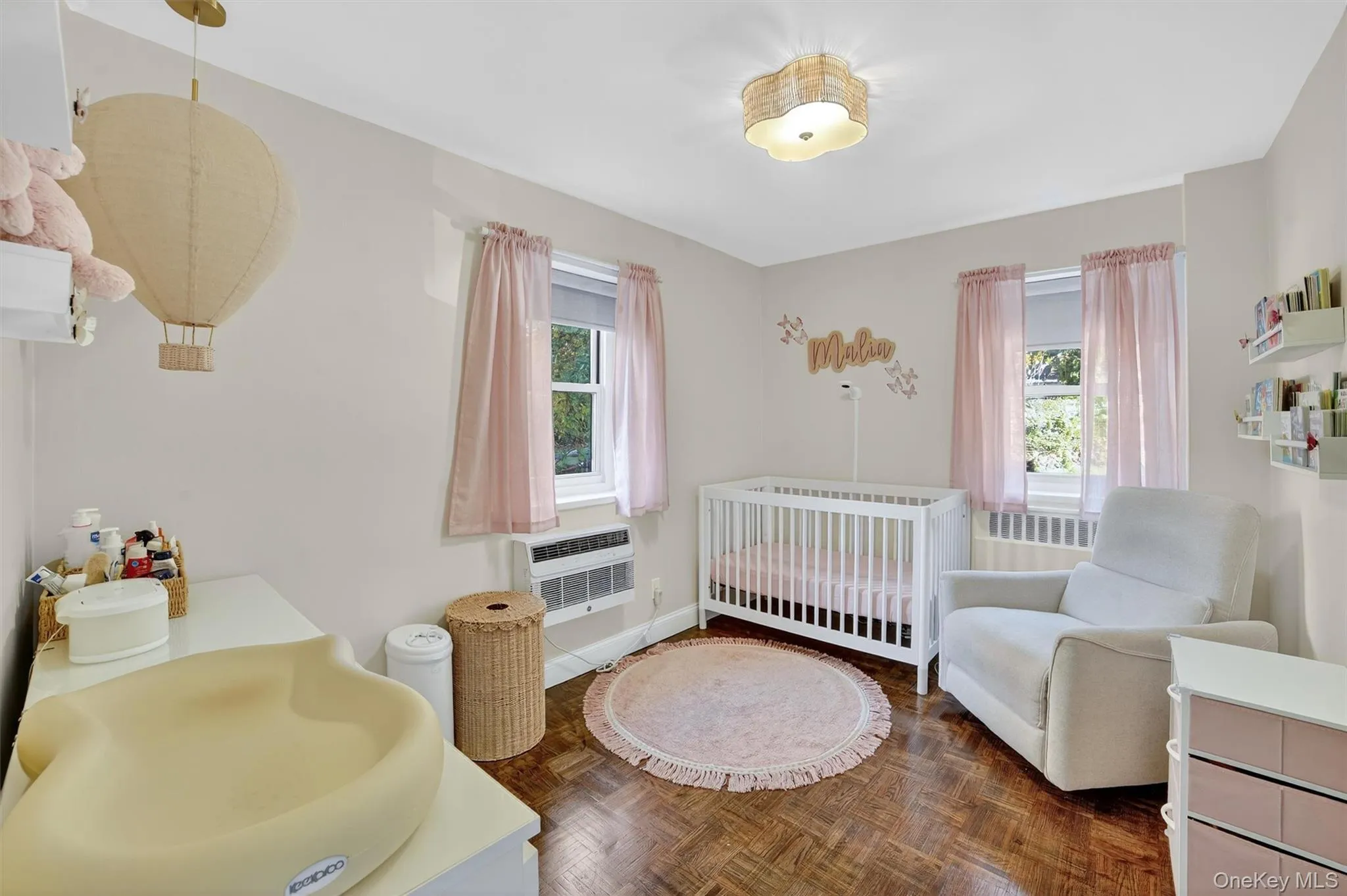 The second bedroom, featuring two exposures, offers a bright and sun-filled atmosphere. The second bedroom, featuring two exposures, offers a bright and sun-filled atmosphere.