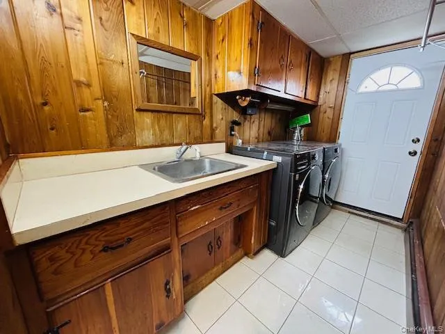 laundry room connected to the garage laundry room connected to the garage