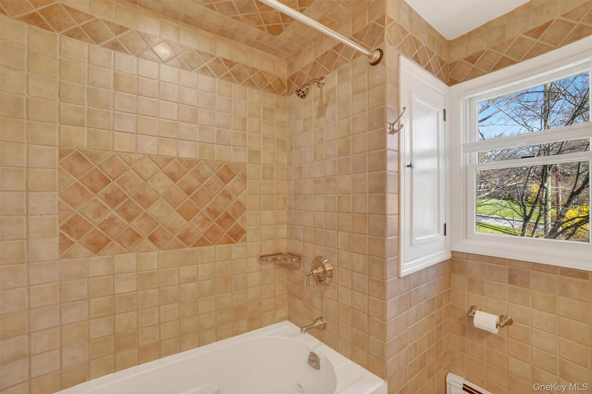 Custom tiled tub surround with the deep jetted tub Custom tiled tub surround with the deep jetted tub