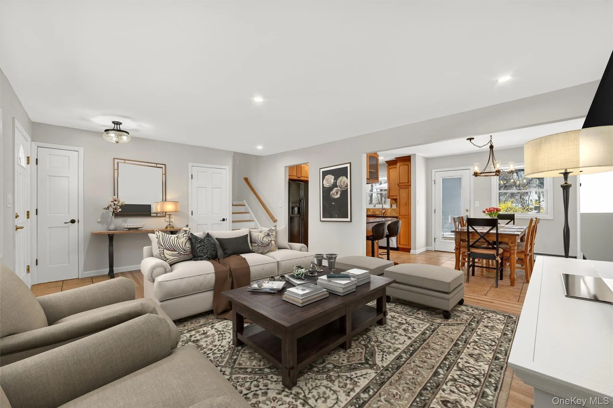Virtually staged view into the dining room. Virtually staged view into the dining room.