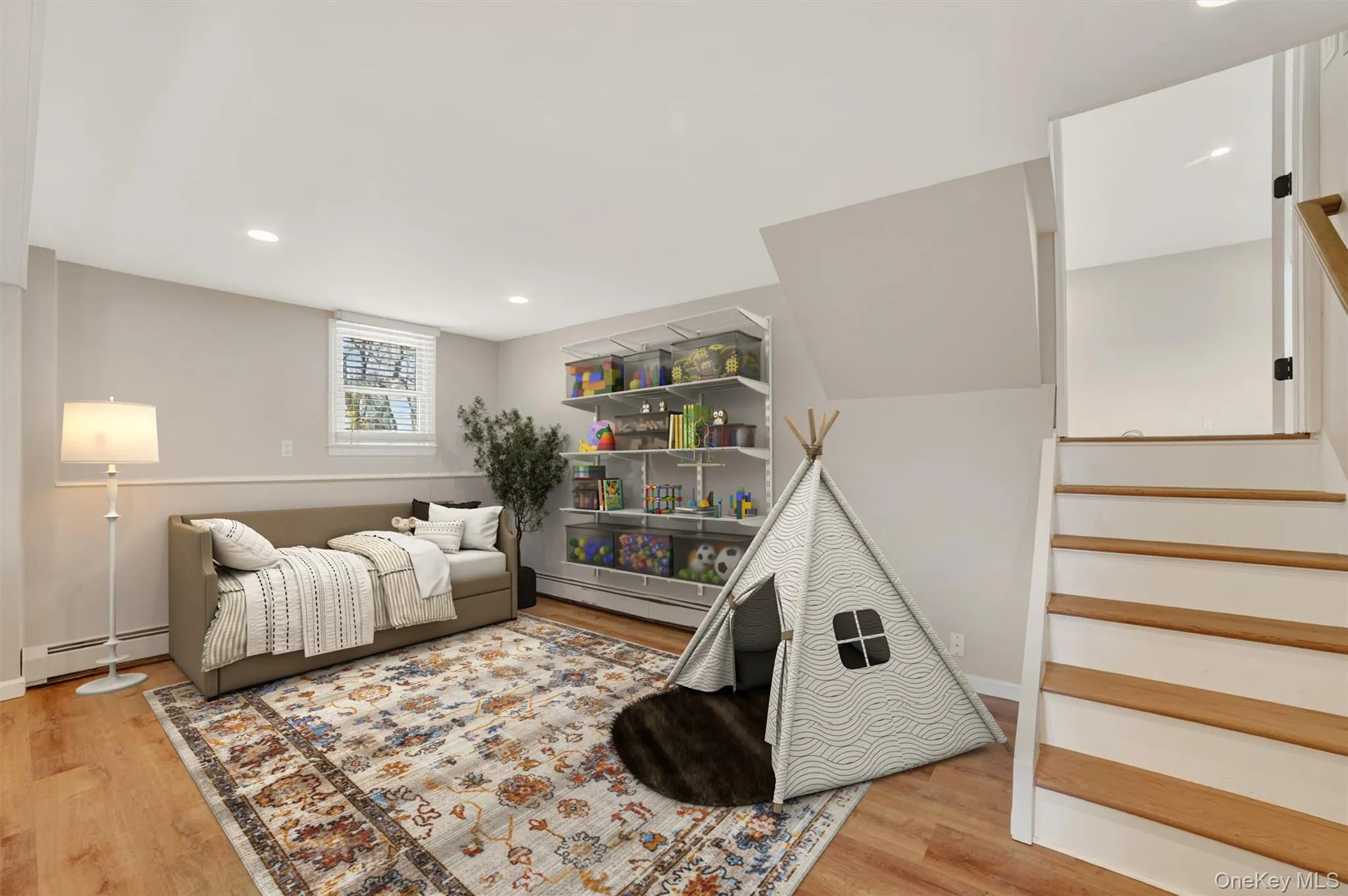 Virtually staged-Lower level daybed and play area Virtually staged-Lower level daybed and play area