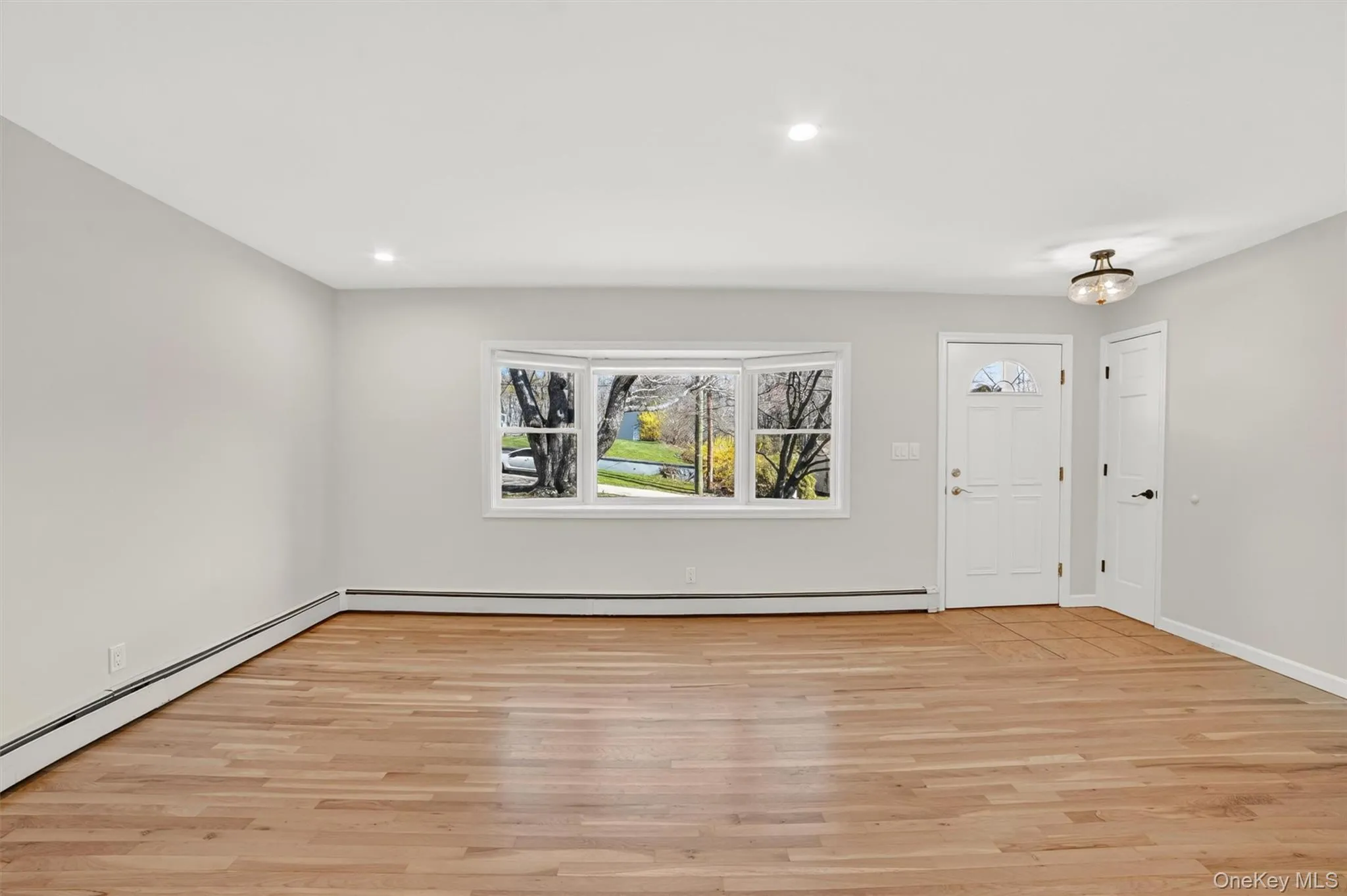 View of the Bow window and stunning Oak floors View of the Bow window and stunning Oak floors
