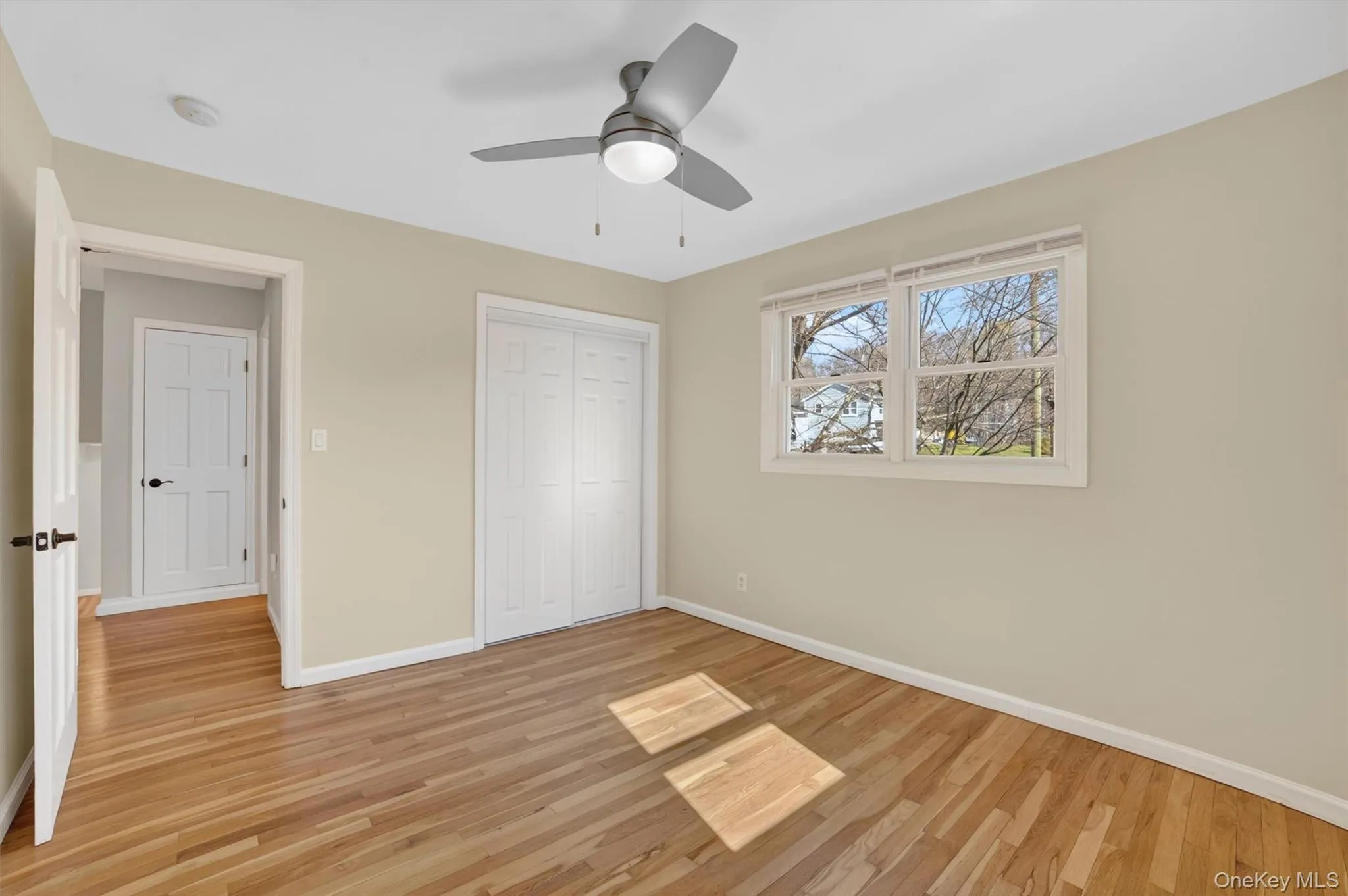 Sunshine streams in and reflects off the oak floors Sunshine streams in and reflects off the oak floors