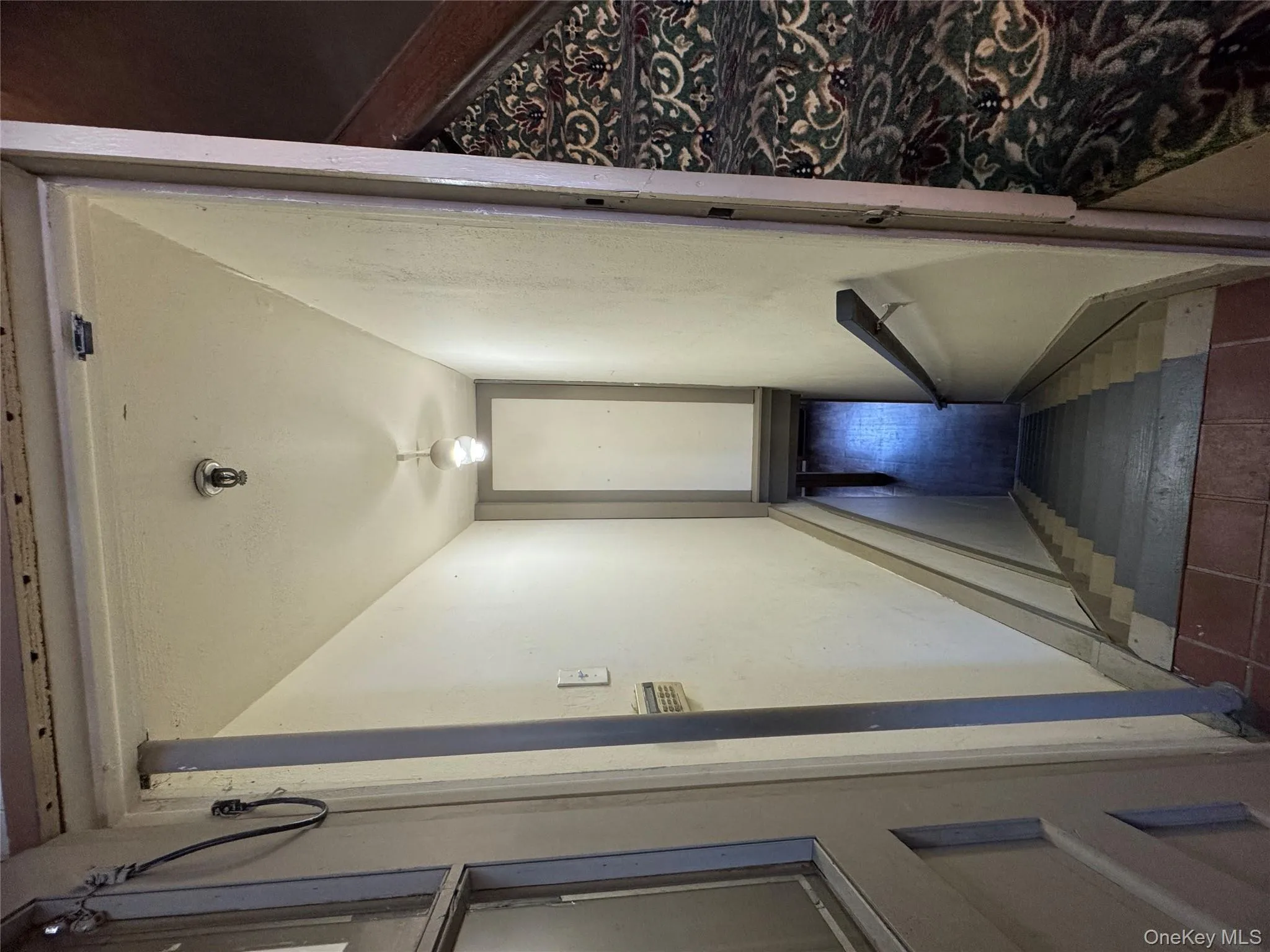 Door to left leads downstairs to unit Door to left leads downstairs to unit