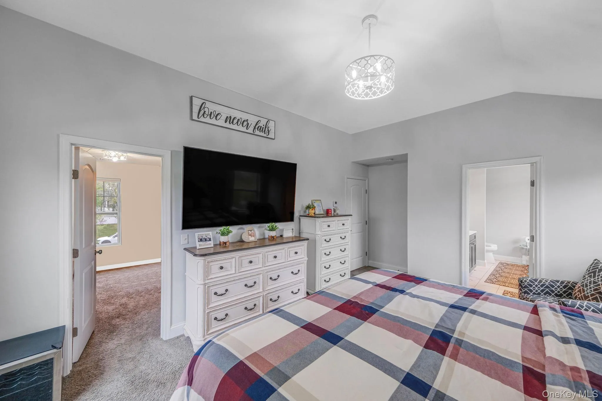 Primary En-Suite with Vaulted Ceilings, Walk In Closet with Custom Built Ins, Primary En-Suite Bathroom Primary En-Suite with Vaulted Ceilings, Walk In Closet with Custom Built Ins, Primary En-Suite Bathroom