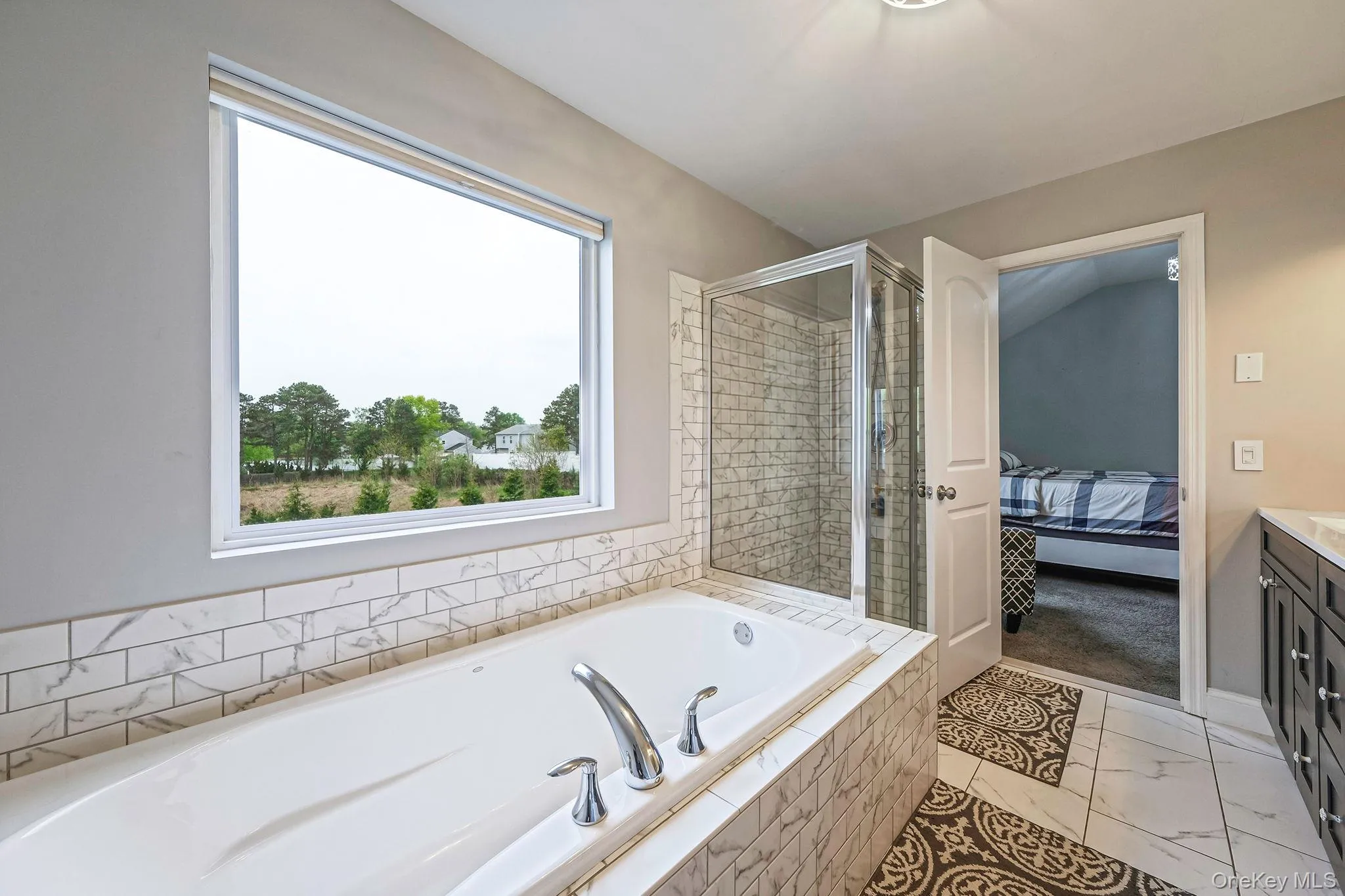 Primary En-Suite Bathroom with Dual Vanity, Walk In Shower, Separate Tub Primary En-Suite Bathroom with Dual Vanity, Walk In Shower, Separate Tub