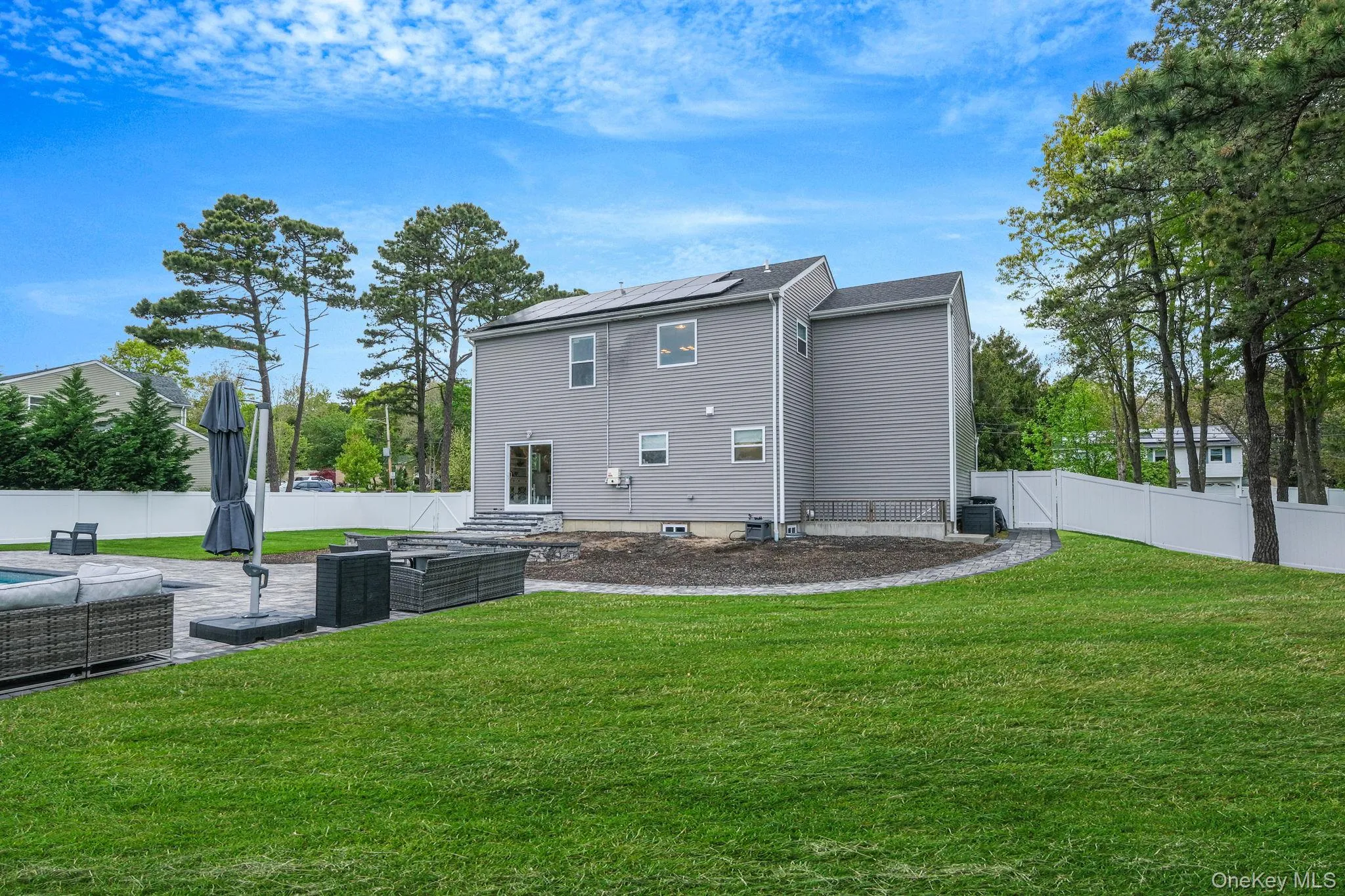 .52 acres with 44’ x 20’ gas-heated Jandy TruGuard mineral in-ground pool with a 10’ sundeck, lounge area, and gorgeous waterfall feature .52 acres with 44’ x 20’ gas-heated Jandy TruGuard mineral in-ground pool with a 10’ sundeck, lounge area, and gorgeous waterfall feature